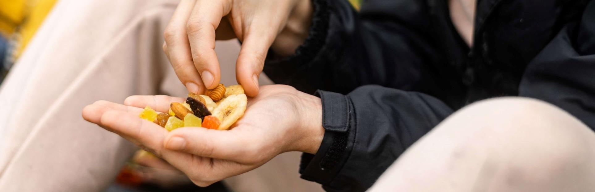 woman holding almonds