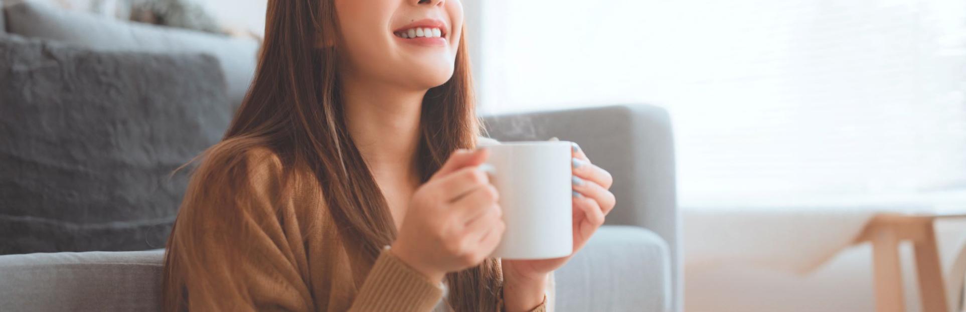 woman drinking beverage