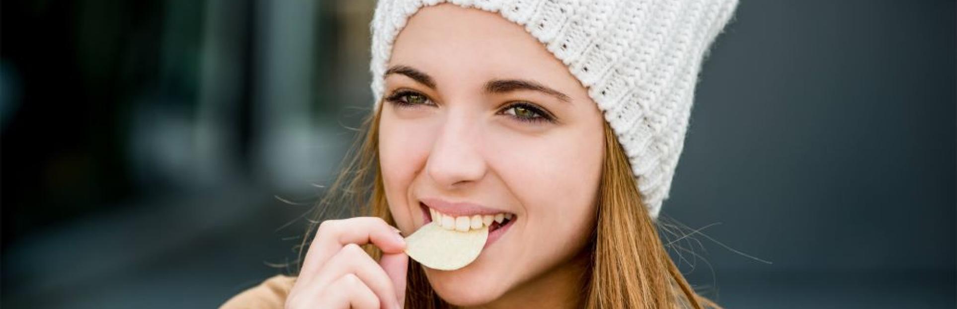 woman eating a chip