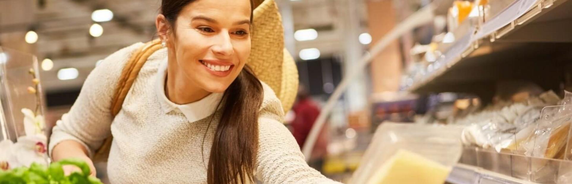 woman looking at cheese