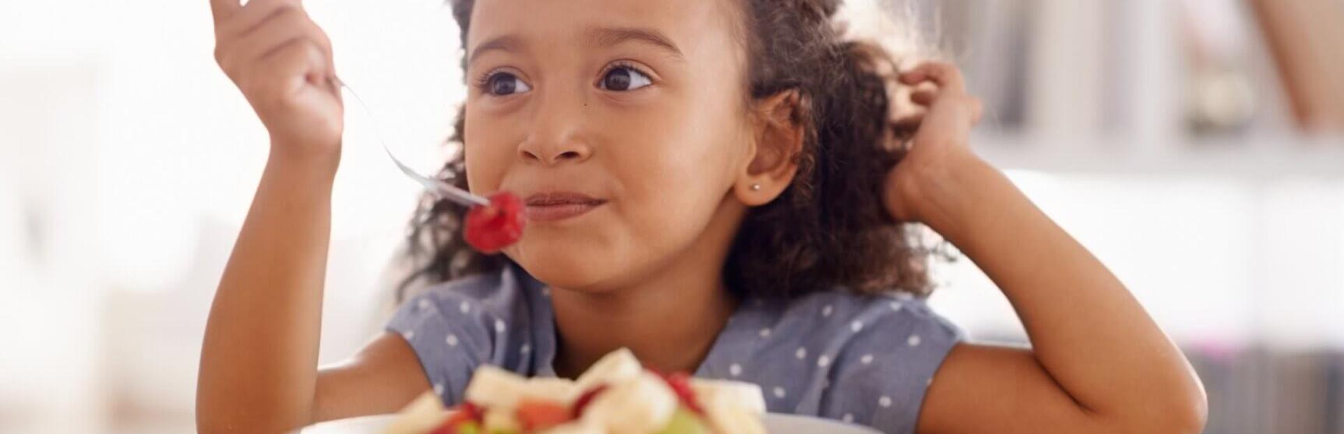 Child eating fruit