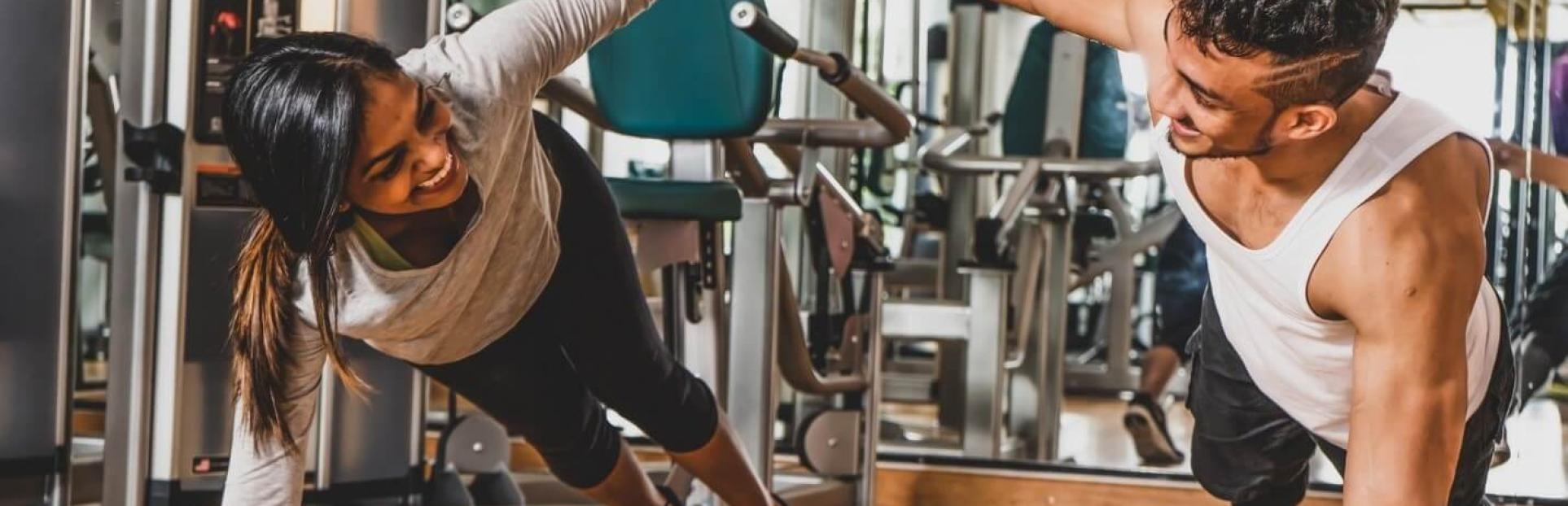 man and woman working out