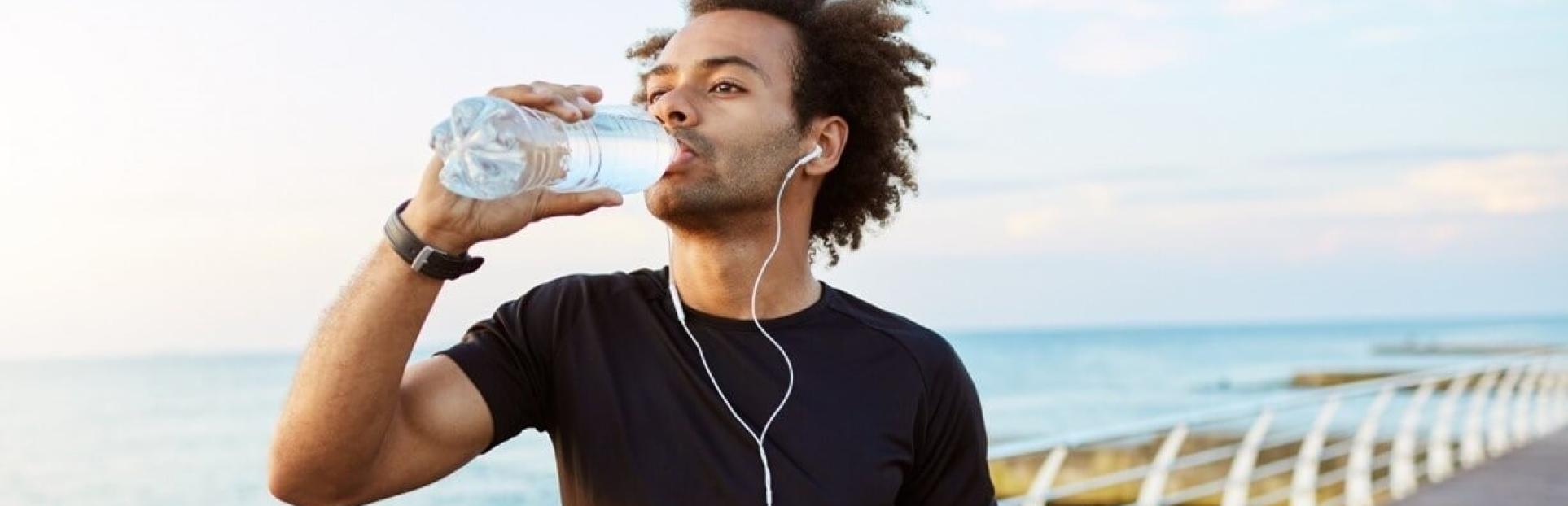 man drinking water
