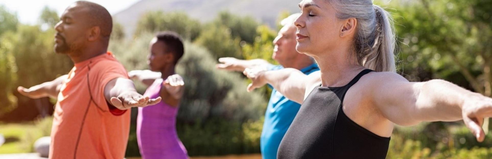 people doing yoga outdoors