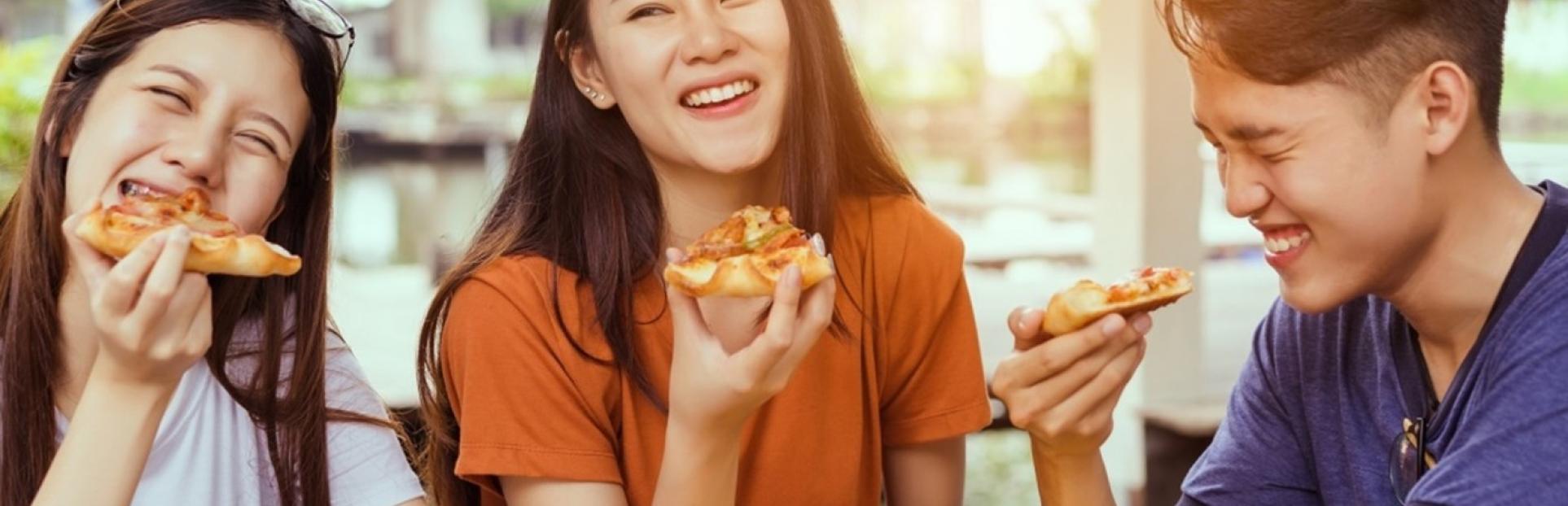 group eating pizza