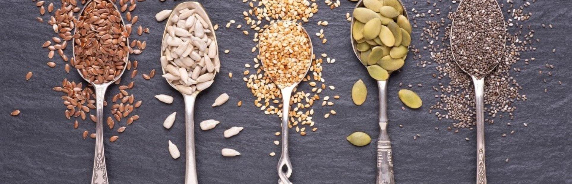 Spoons filled with seeds