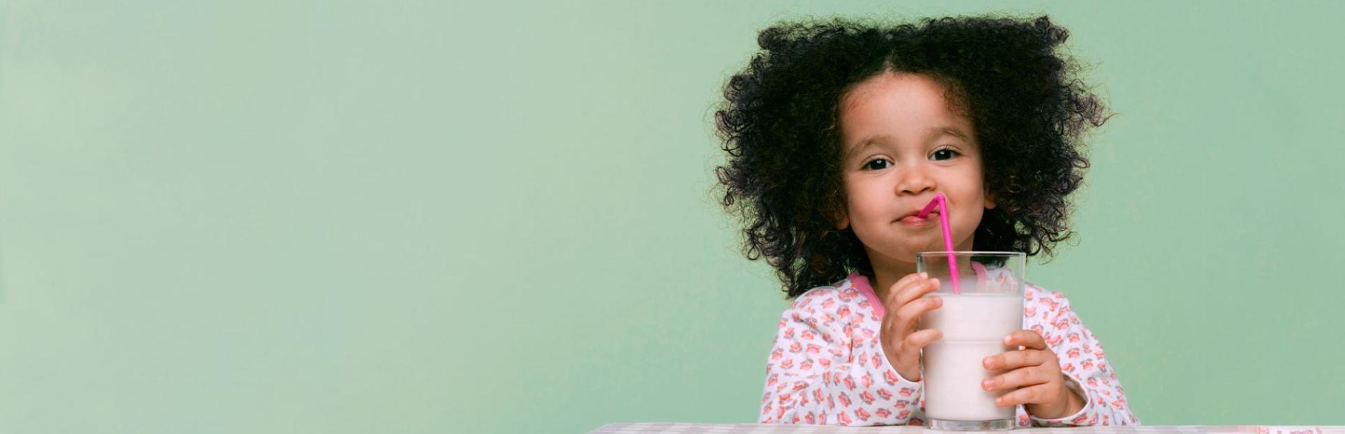 toddler with milk