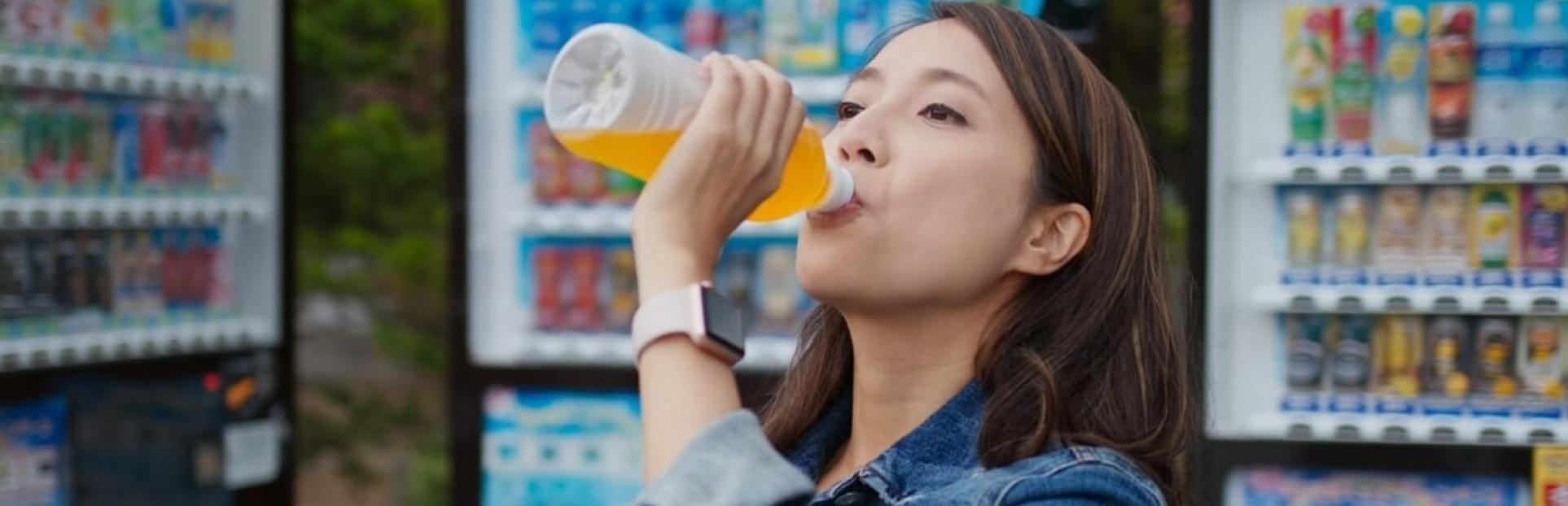 woman drinking beverage