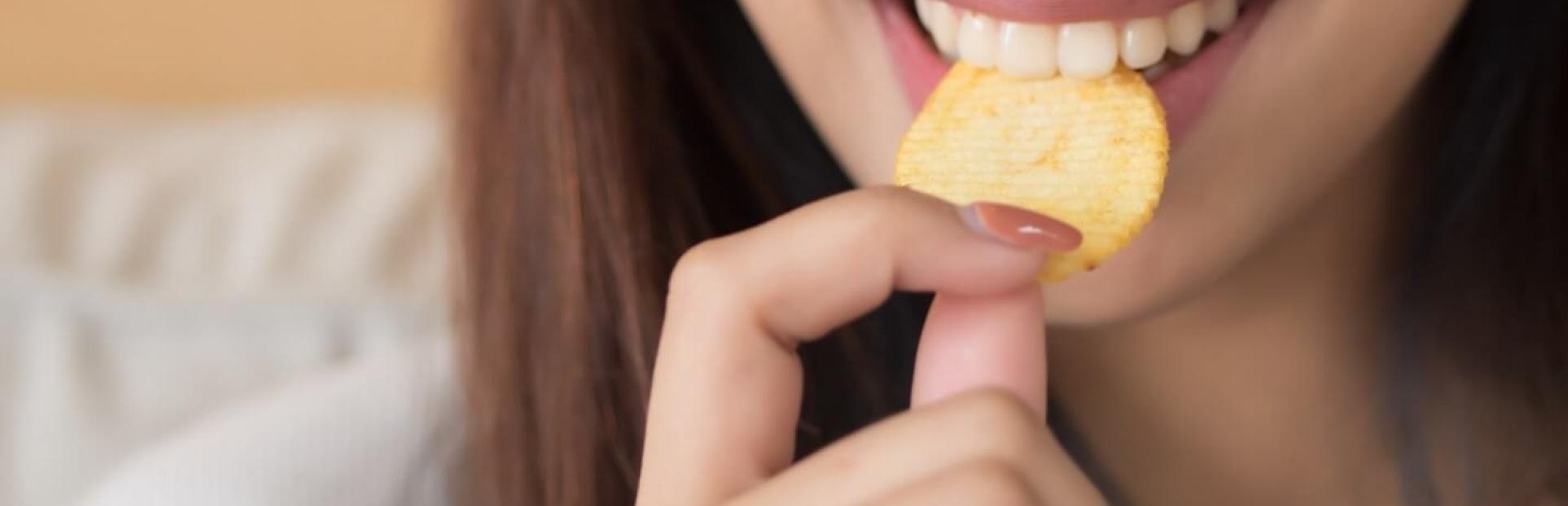 woman eating chip