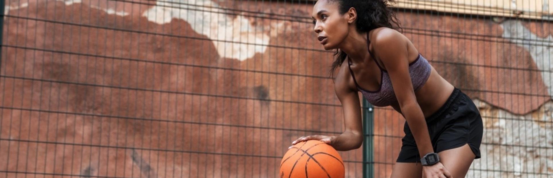 woman playing basketball