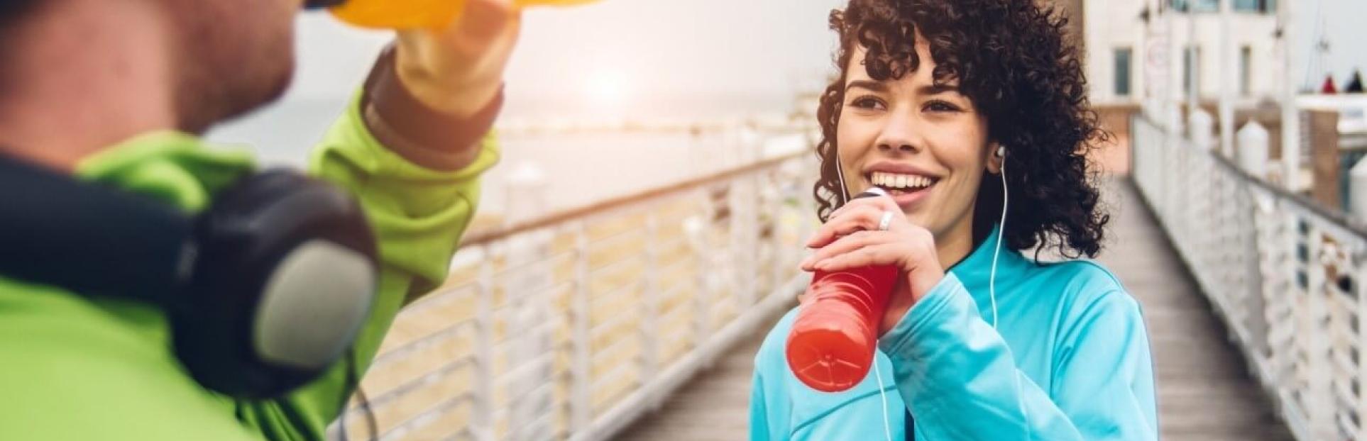 woman drinking after workout