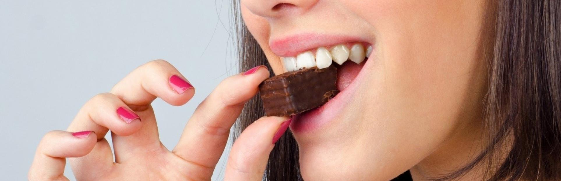 woman eating chocolate