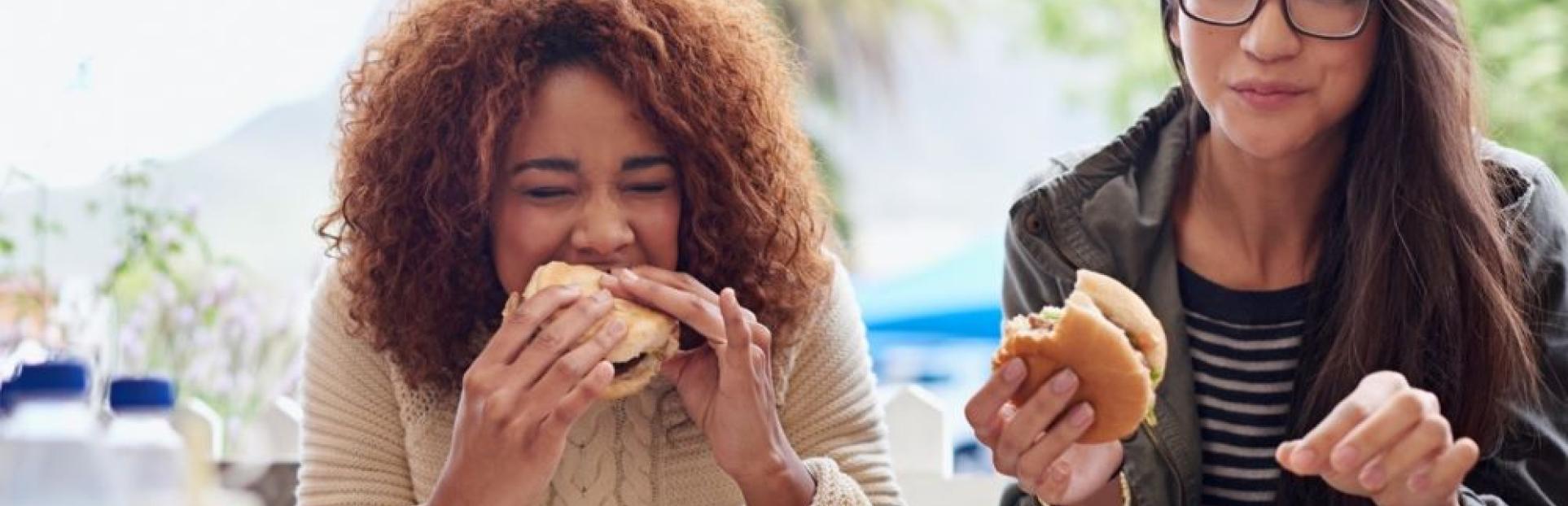 woman eating sandwich