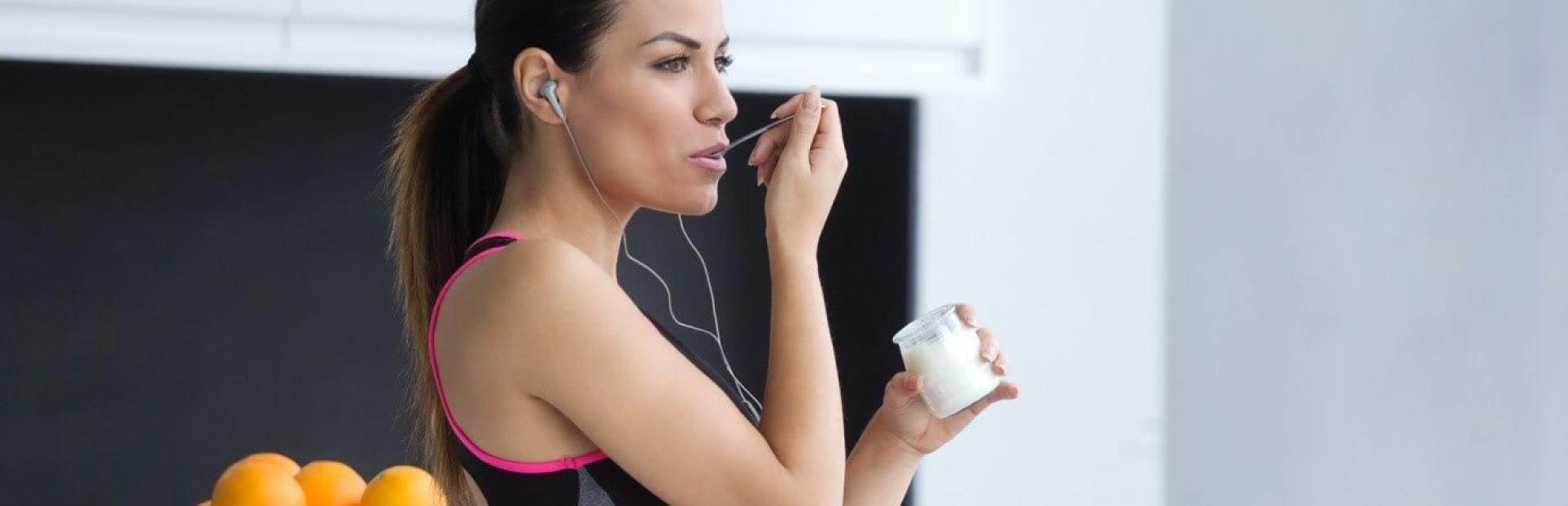 woman eating yogurt