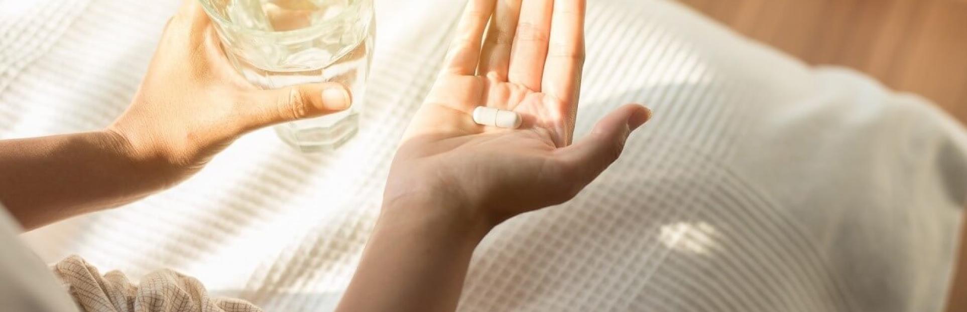 woman holding supplement