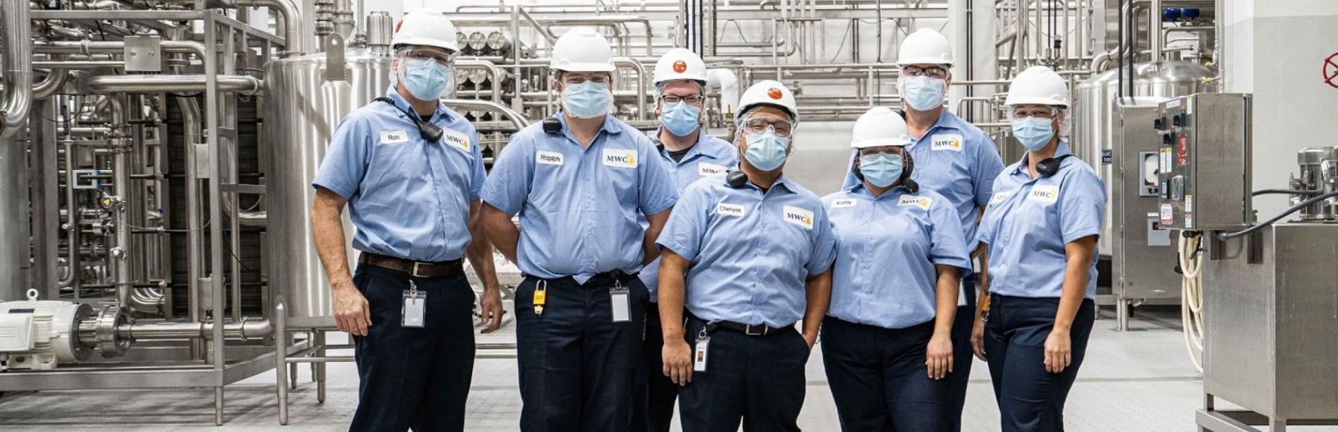 mwc staff in factory