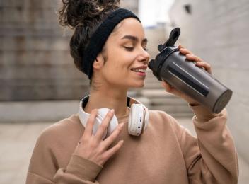 woman drinking protein shake