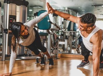 man and woman working out
