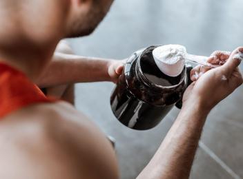 man with protein powder