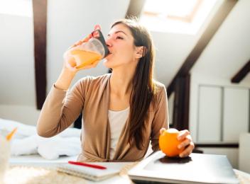 woman drinking premix drink