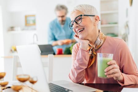 mature woman with green juice