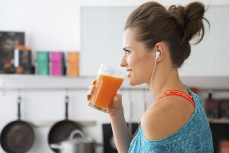 woman with orange drink