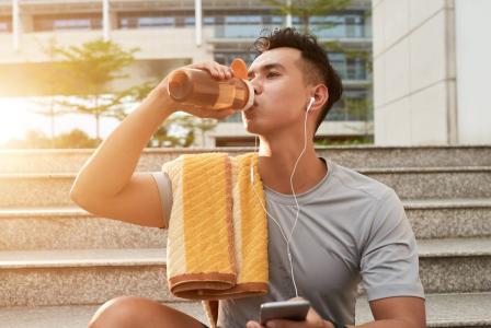 man with protein shake