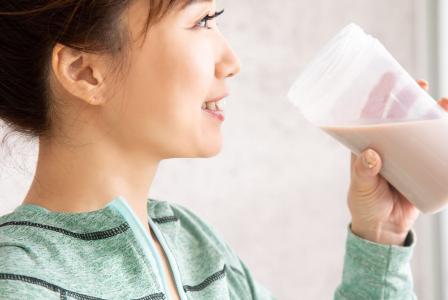 woman with protein shake