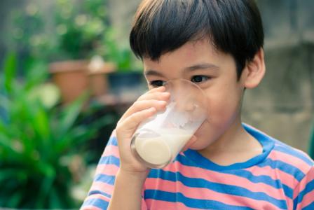 boy with trucal milk