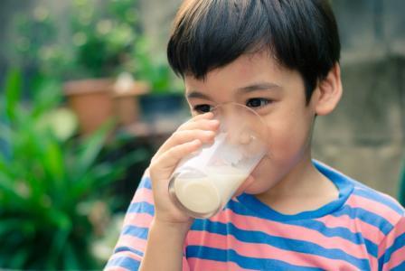 boy with trucal milk