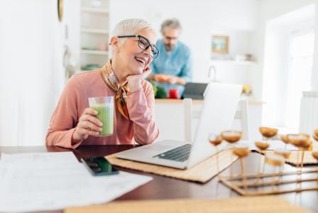 mature woman with green beverage