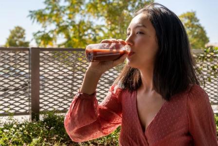 woman drinking beverage