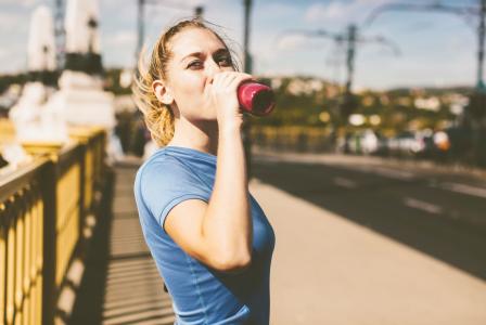 woman drinking beverage