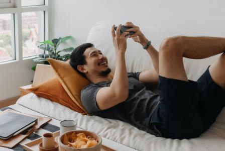 man laying on couch