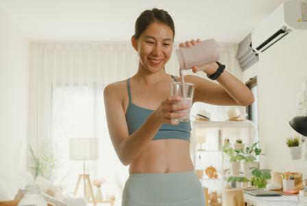 woman and protein shaker