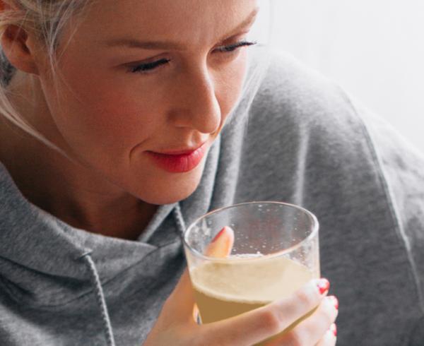 woman drinking bevedge pea protein
