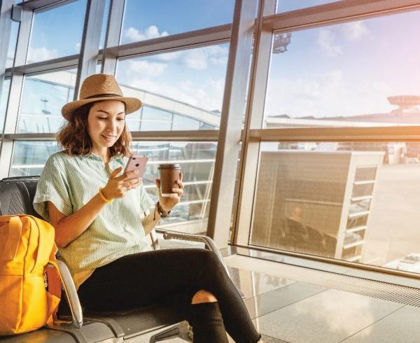 woman at airport on phone