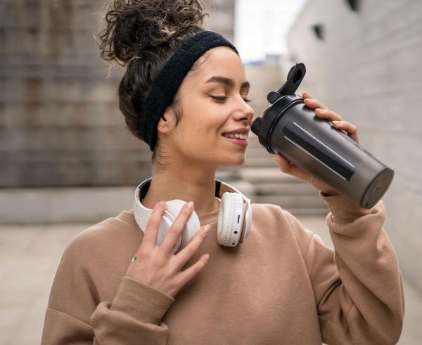 woman drinking protein shake