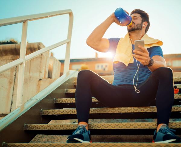 man drinking protein shake