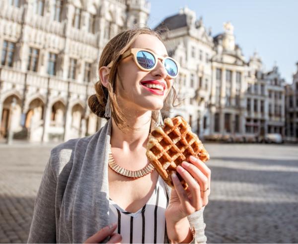 woman eating waffle