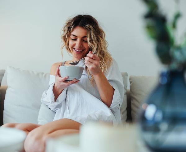 woman eating cereal