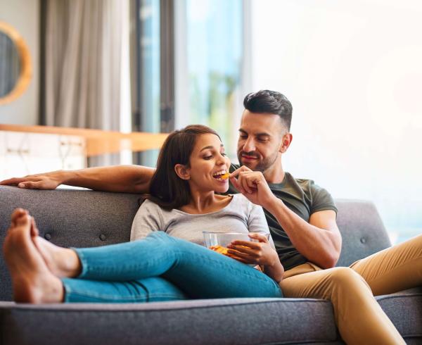 man and woman on couch