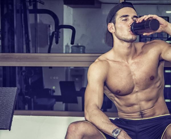 man drinking protein shake