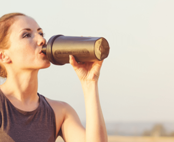 girl drinking protein shake