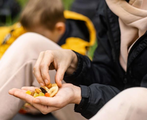 woman holding almonds