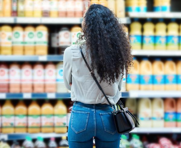 woman looking at beverages 