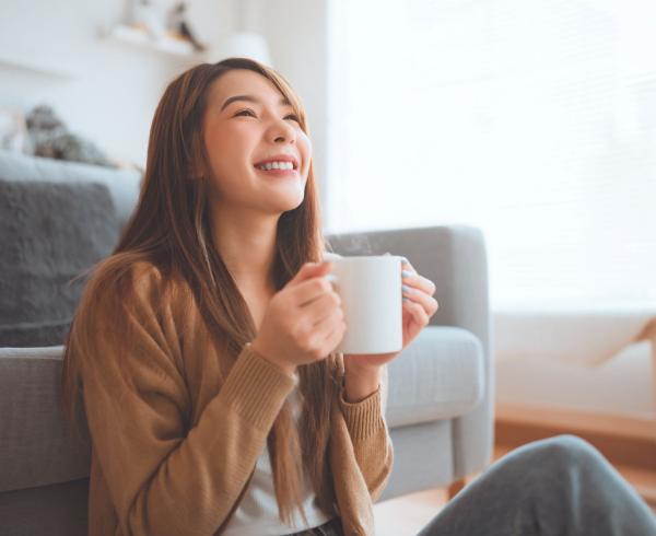 woman drinking beverage