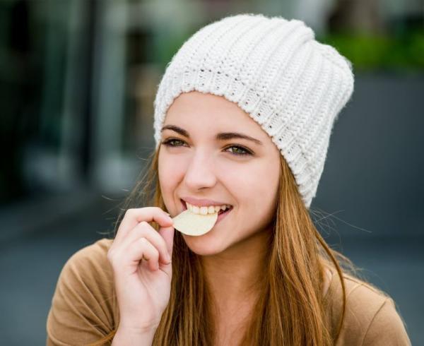 woman eating a chip