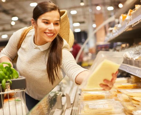 woman looking at cheese