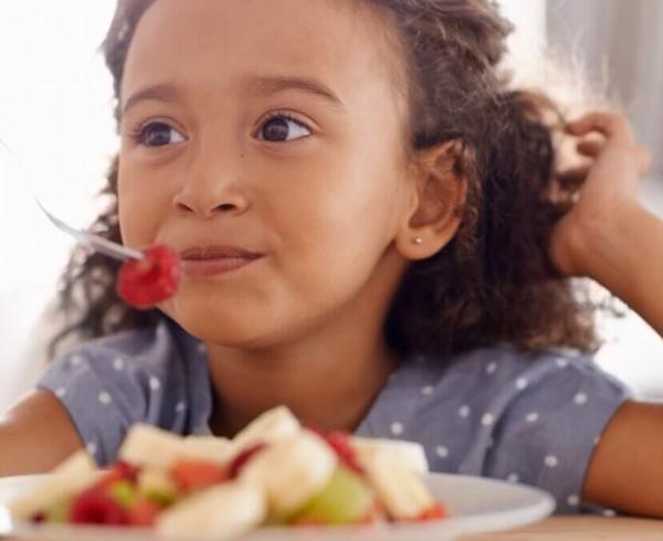 Child eating fruit